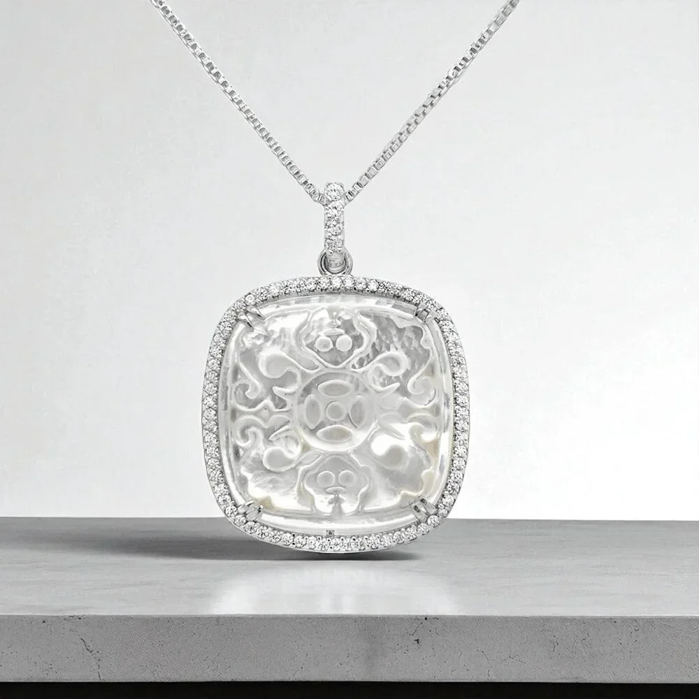 Carved Mother-of-Pearl and CZ Pendant in 925 Sterling Silver - Picture 1 of 3
